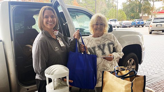 Cancer center partners with community for holiday giveback